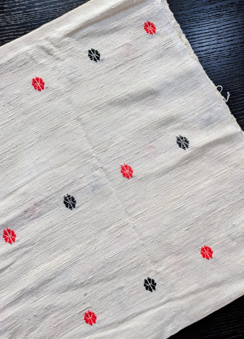 Running Fabric- Mercerised Cotton + Eri Silk with red and black motifs