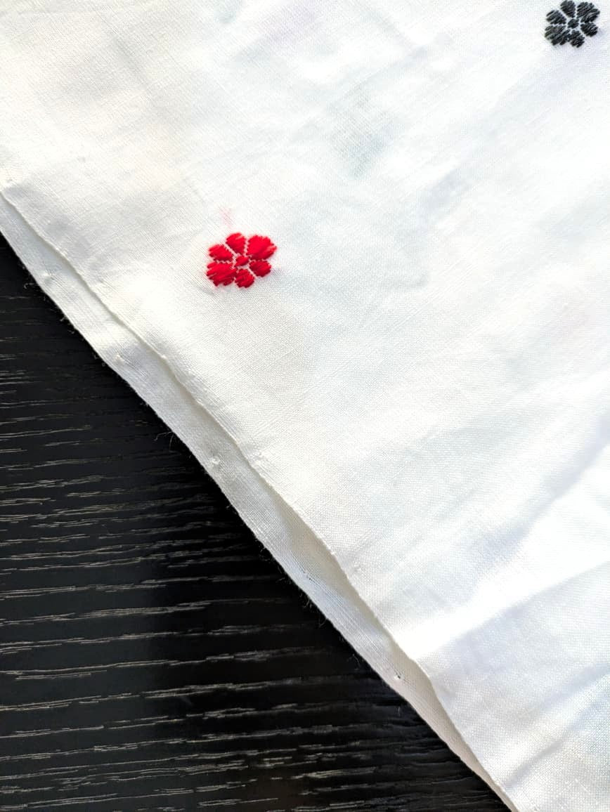 Running Fabric- White Mercerised cotton with multicolored motifs