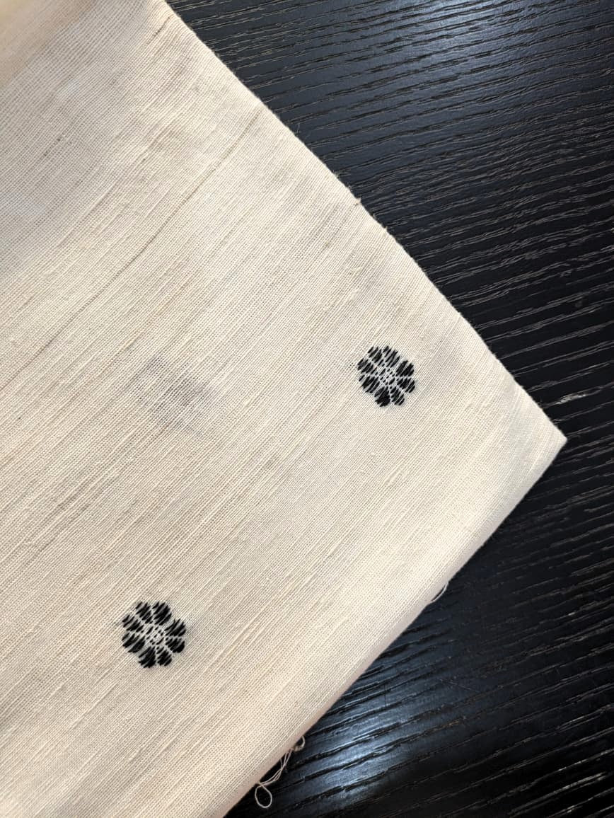 Running Fabric- Mercerised Cotton+ Eri Silk with Black motifs